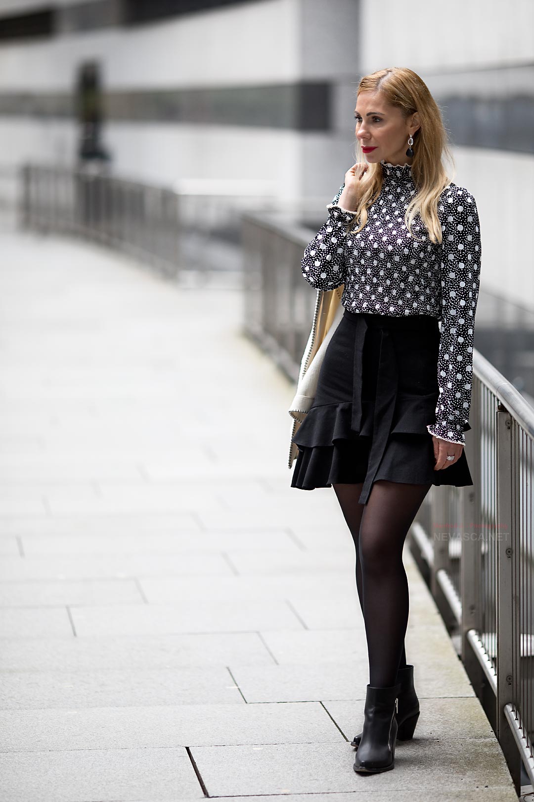 Fashion photo of a woman in the banking quarter in Stuttgart.